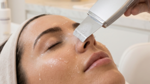 An ultrasonic facial treatment being performed to provide urban deep pore cleansing at Glow Clinics in San Jose.